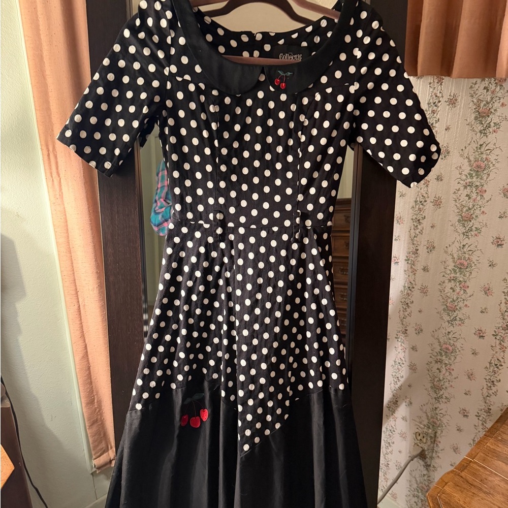 Collectif Black Dress with White Polka Dots and cherry accents